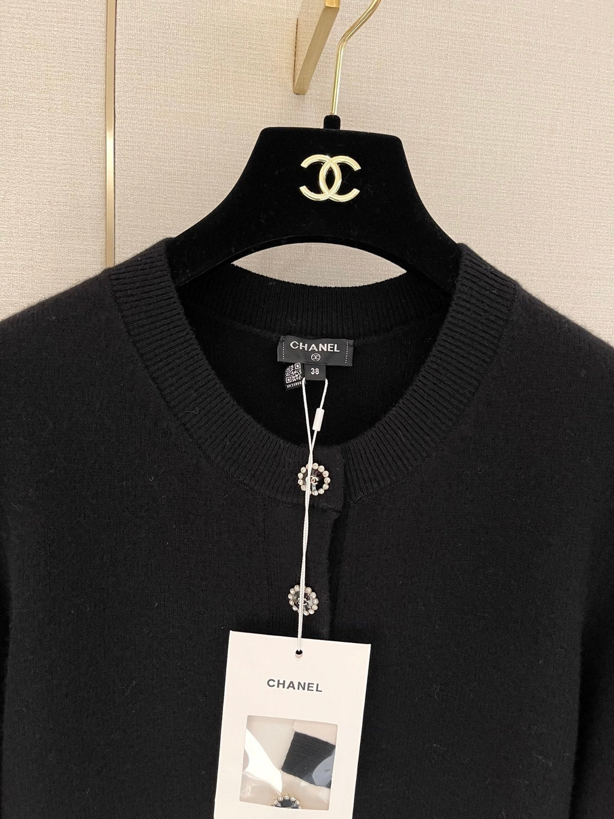 Bow-tie openwork cashmere cardigan with short sleeves