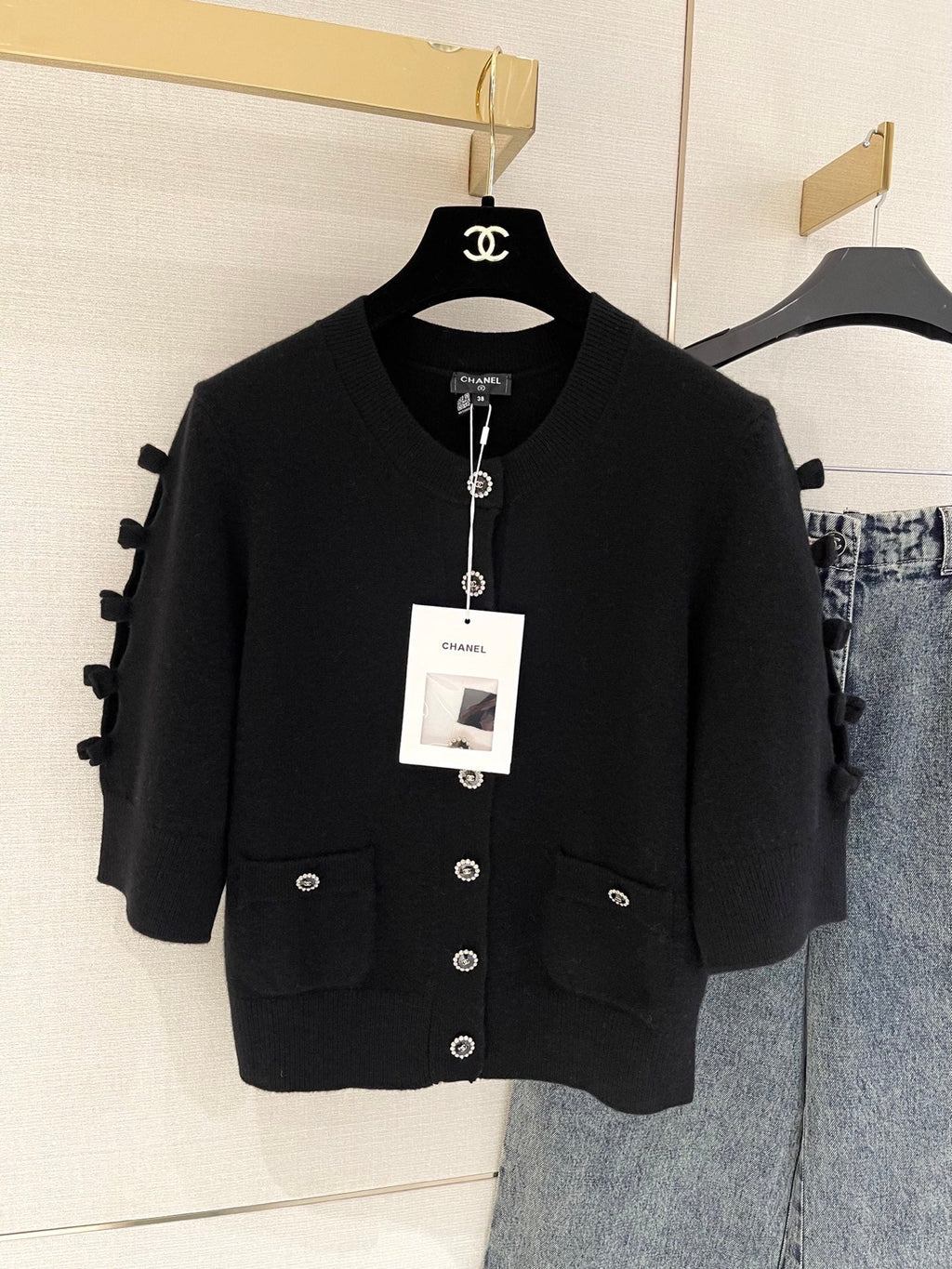 Bow-tie openwork cashmere cardigan with short sleeves