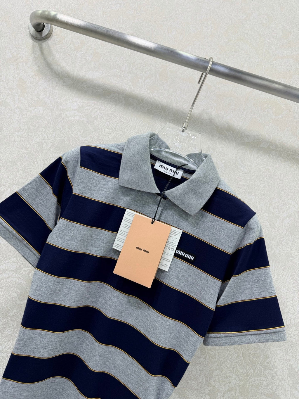 Striped collared short-sleeved polo shirt