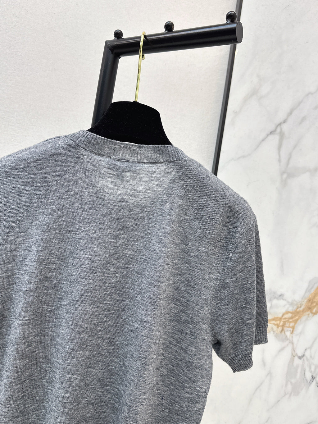 Warm-toned knit short-sleeved top