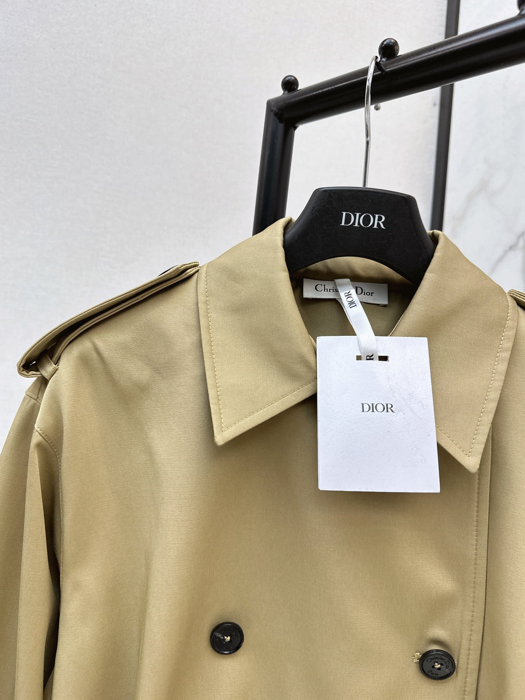 Short trench coat with bee embroidery