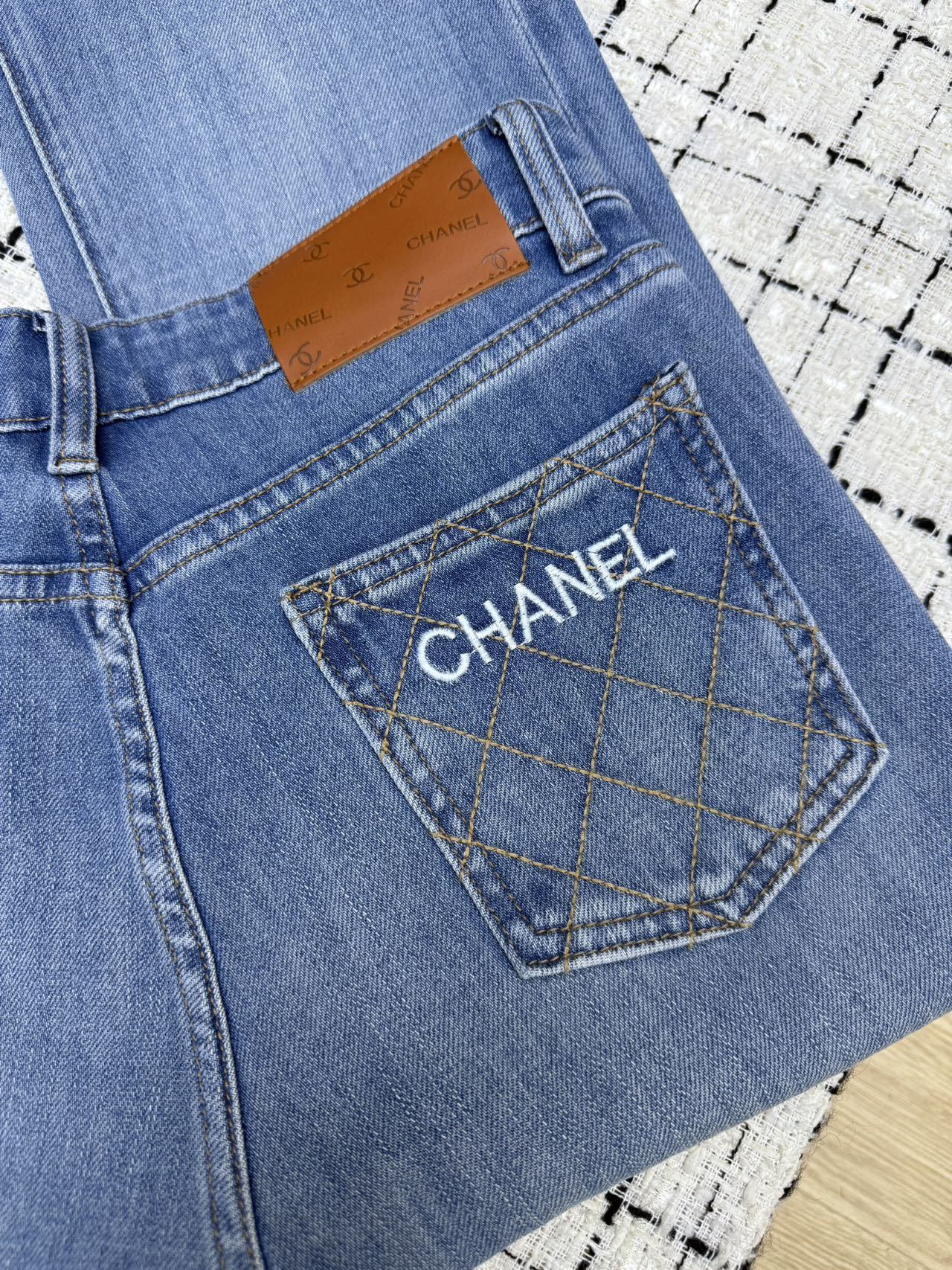 Embroidered mesh flared pants with back pockets
