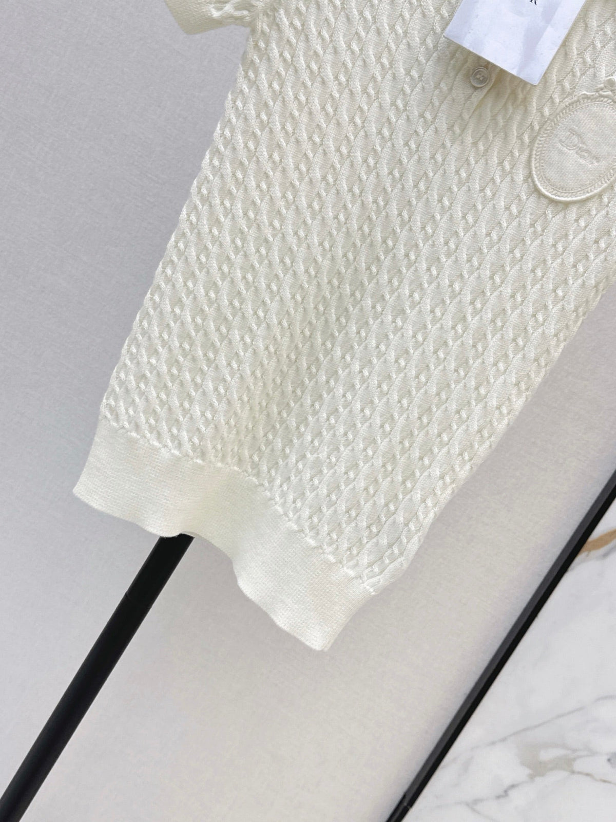 Short-sleeved knitted polo sweater