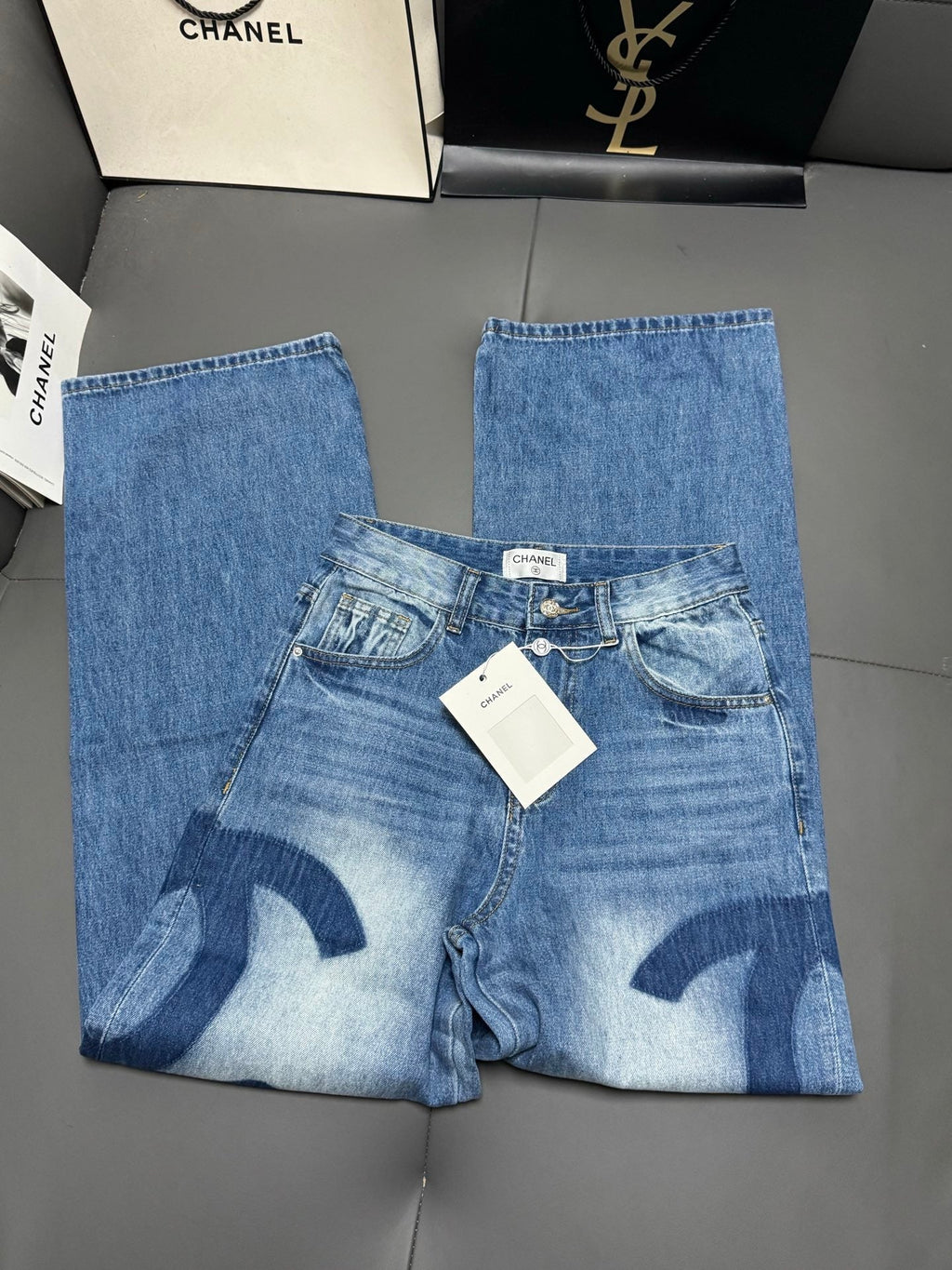 Straight-leg jeans with a "shadow logo" design