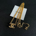 DOUBLE C HEART NECKLACE IN GOLD METAL